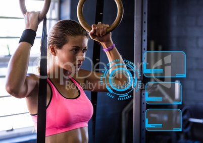 Woman practicing gymnastic exercise against digital interface in background