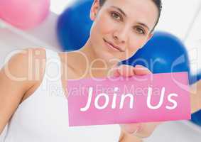 Portrait of fit woman showing join us card
