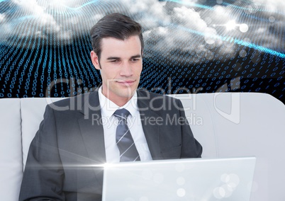 Businessman using laptop against binary codes interface