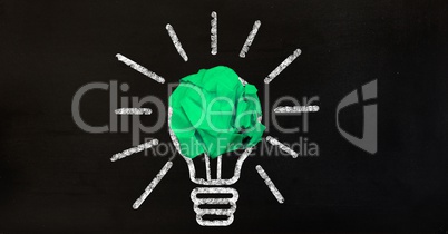 Crumpled paper ball with light bulb concept
