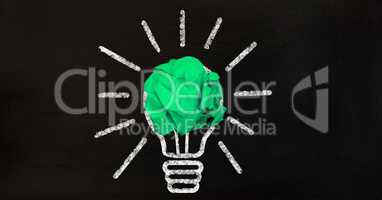 Crumpled paper ball with light bulb concept