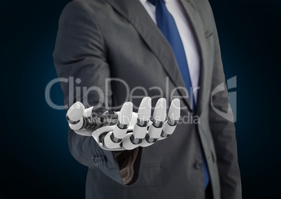 Businessman with robot hand  against blue background
