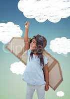 Girl with artificial wings flying against sky in background
