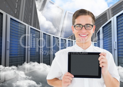 Man holding digital tablet against database server systems in sky