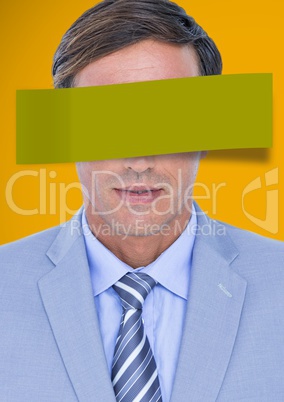 Businessman covered eyes with blank green note against yellow background