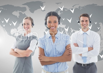 Customer service executive in headset standing with arms crossed