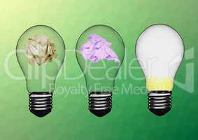 Electric bulbs with crumpled paper against green background