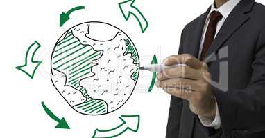 Mid section of businessman drawing a globe against white background