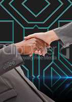 Business professionals shaking hands against digital background