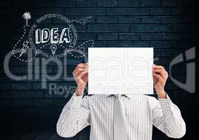 Businessman holding placard with idea graphic concept