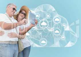 Couple using digital tablet against digitally generated background