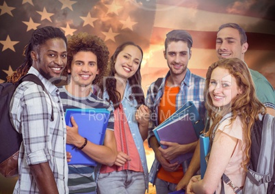 Friends standing together against american flag in background