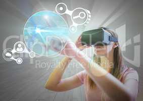 Woman using virtual reality headset and touching futuristic  interface