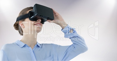 Businesswoman using virtual reality headset