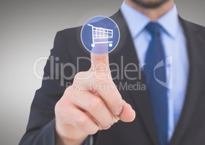 Businessman touching shopping cart icon on interface screen