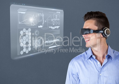 Man using virtual reality glasses with interface screen