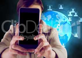 Woman holding mobile phone against networking icons