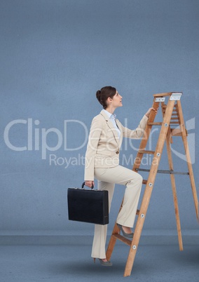 Businesswoman with briefcase climbing on step ladder