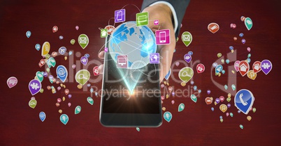 Man holding smartphone with various application icons