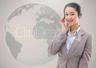 Customer service woman in headset against globe in the background