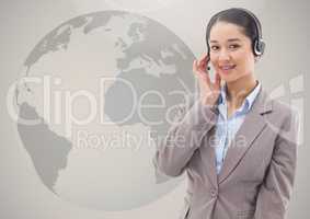 Customer service woman in headset against globe in the background