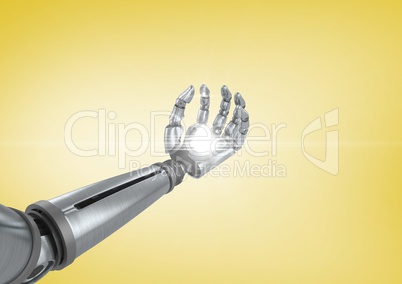 Robot hand with light flare against yellow background