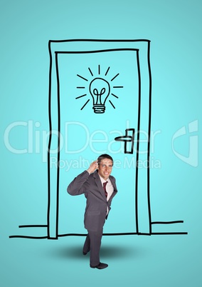 Businessman standing against graphic door and light bulb