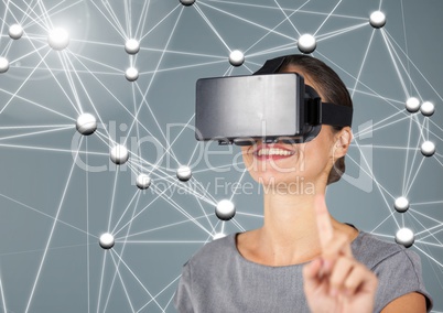Digitally generated image of woman using virtual reality headset