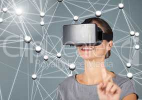 Digitally generated image of woman using virtual reality headset