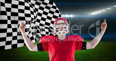 American football player celebrating his victory against checkered flag