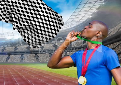 Athlete kissing his gold medal in stadium
