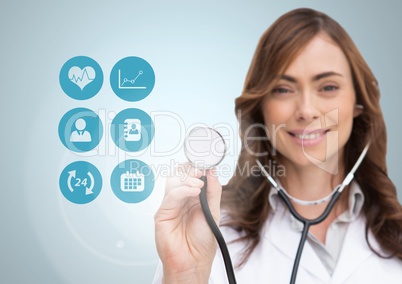 Female doctor touching stethoscope on digitally generated medical icons against white background