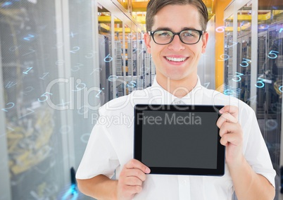 Man holding digital tablet against server room in background