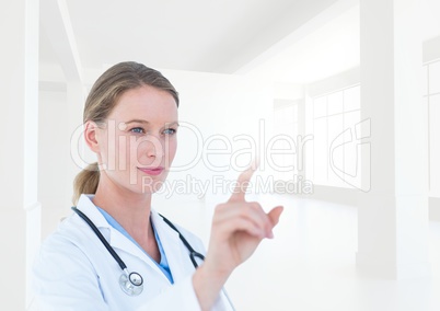 Doctor with stethoscope using digital screen