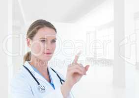 Doctor with stethoscope using digital screen