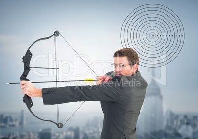 Businessman holding bow and arrow while aiming