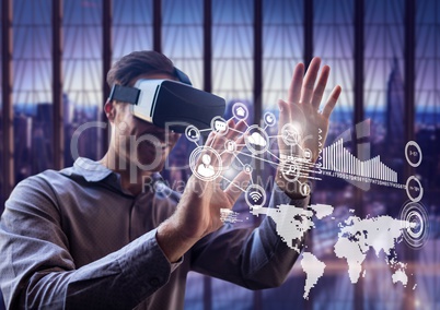 Man using virtual reality headset with networking  icons