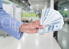 Businessman hand holding dollar banknotes