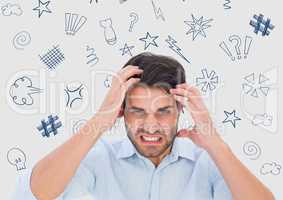 Frustrated man standing with graphics over head