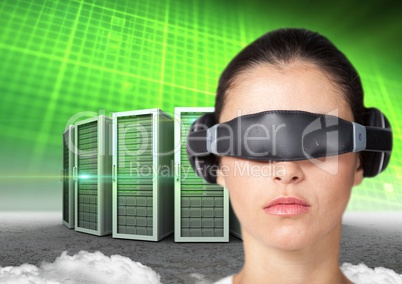 Woman using virtual reality headset against server tower