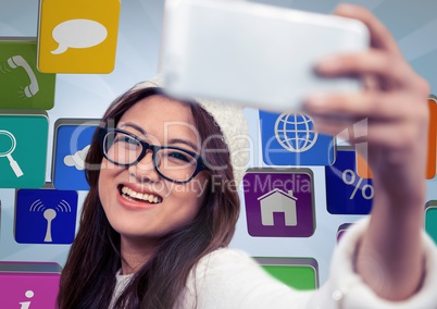 Digital composite image of a girl clicking selfie
