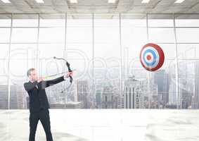 Businessman hitting with bow and arrow against cityscape background