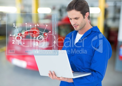 Automobile mechanic using laptop