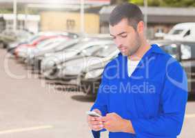 Automobile mechanic using mobile phone