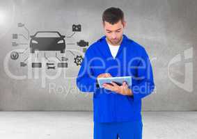 Mechanic using digital tablet against car mechanic interface in background