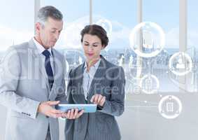 Businesspeople using digital tablet with multiple models interface against cityscape background