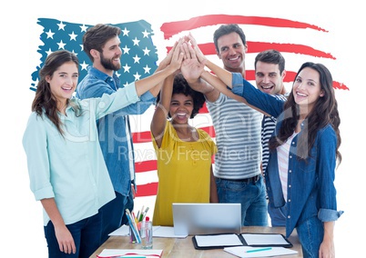 Executives doing hand stack against american flag in background at office