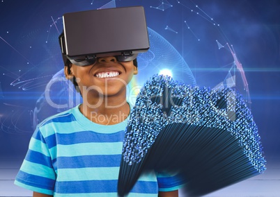 Cheerful boy using virtual reality headset and fibre optics interface