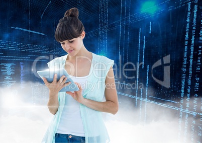 Woman using digital tablet with binary codes in background