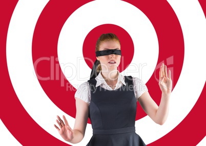 Blindfolded woman walking with her hands forward